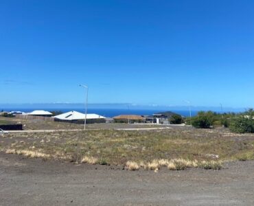 Slightly elevated level lot with ocean views.