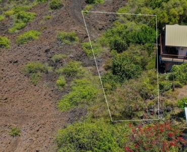 Large end lot at the lower section of Kona Paradise near the beach.