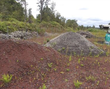 Piles of landscaping material waiting for you.  Just think of the beautiful garden you can have.  Three acres prepped and waiting you special touch.