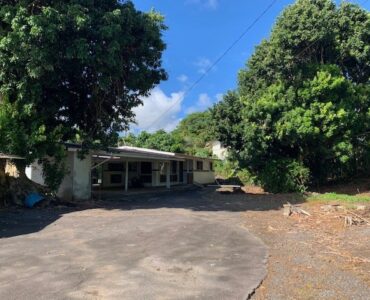 Main house which sits toward rear of property