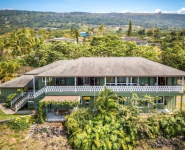 This plantation style home is perfectly positioned to capture both mountain and ocean breezes.